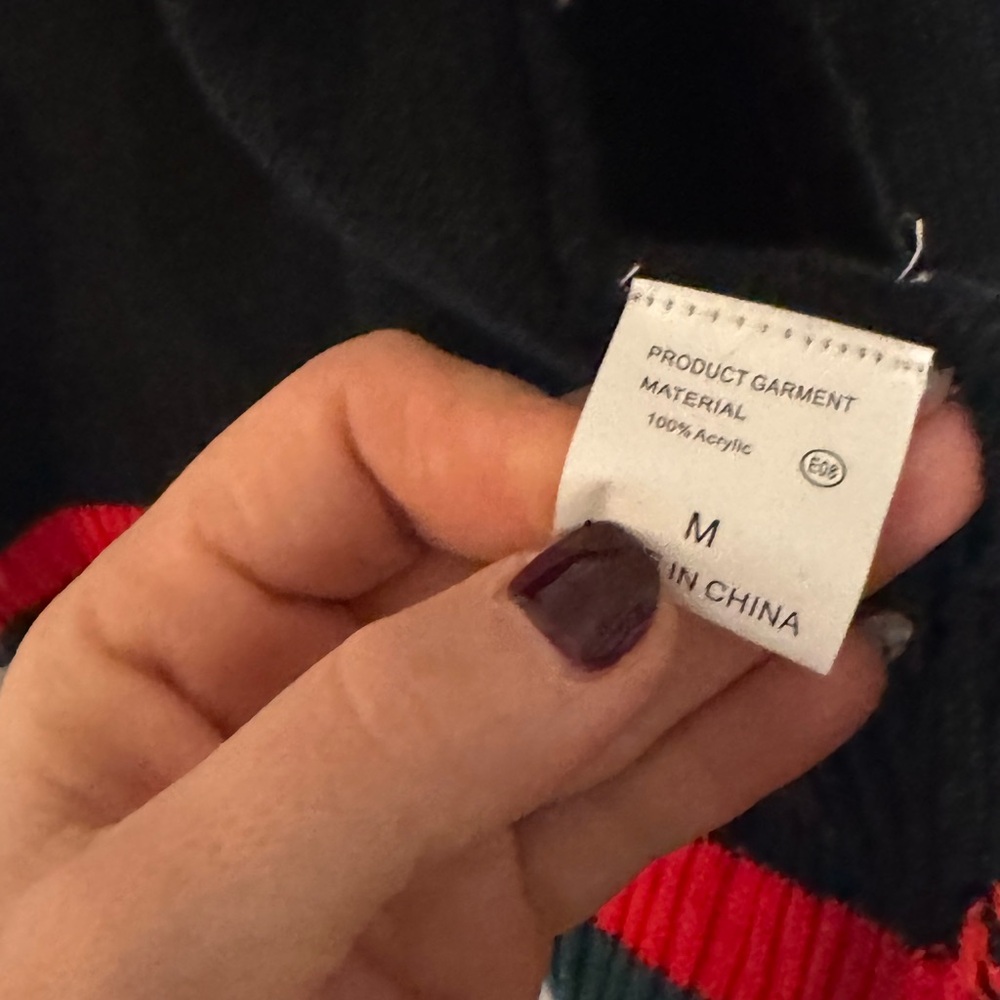 Chic Black Sweater with Red and Green Stripes - Picture 4 of 5